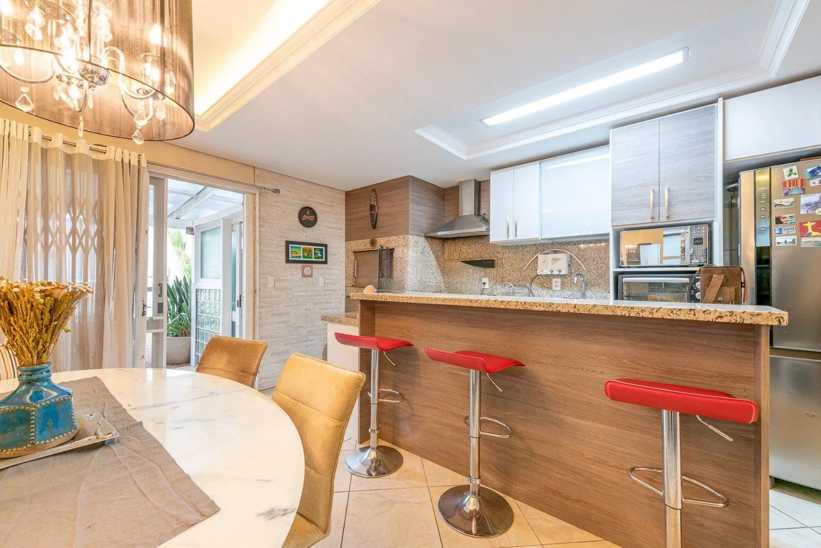 Imagem Casa com 3 dormitórios, suíte, pátio com spa, 3 vagas, Rua do Pampa - Ecoville