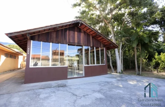 Imagem Sítio Lindo, com uma bela cachoeira, com cabanas e casa, em Governador Celso Ramos - SC