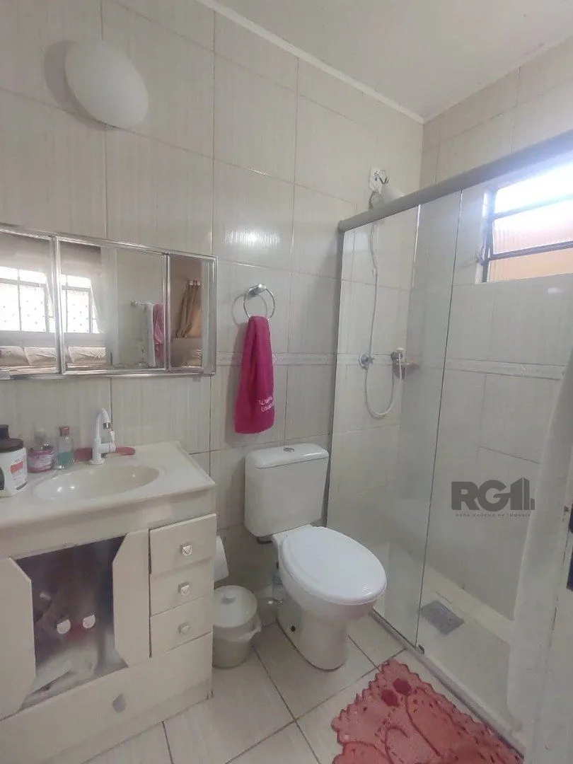 Imagem Casa de 3 dormitórios, 1 suíte e 2 vagas de garagem em Viamão.