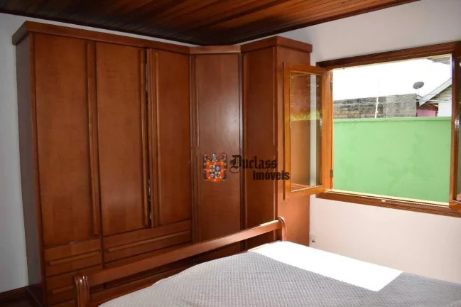 Imagem Casa com 3 dormitórios à venda, 285 m² por R$ 1.250.000,00 - Jardim Toriba - Campos do Jordão/SP