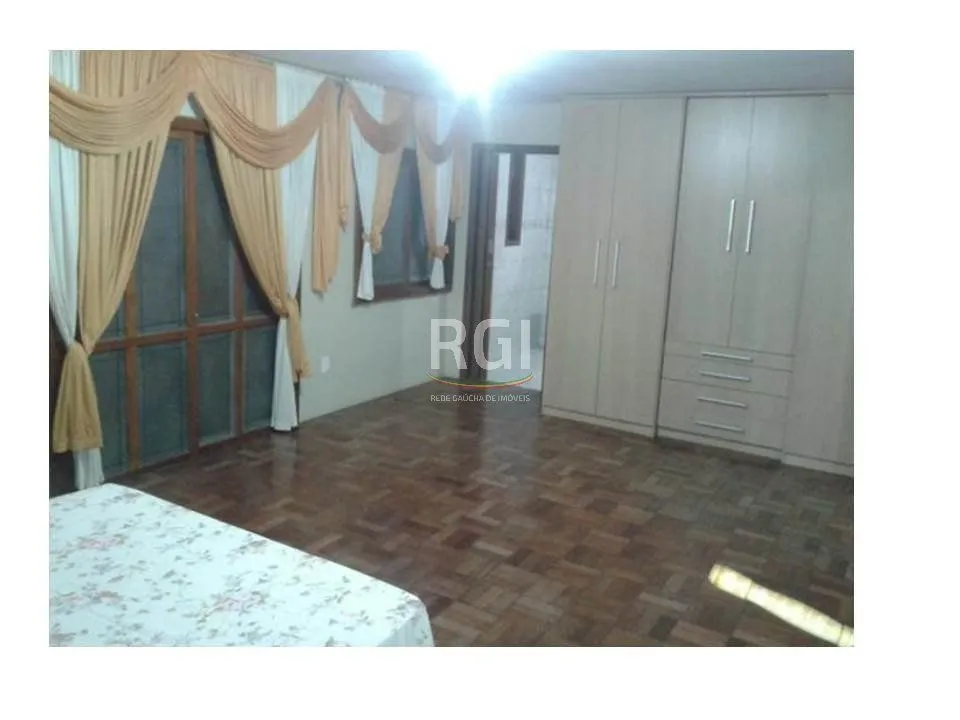 Imagem Casa para Venda - 634m², 2 dormitórios, sendo 1 suites, 3 vagas - Lomba do Pinheiro