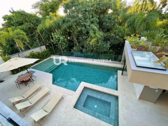 Imagem Casa de alto padrão na Riviera com design refinado e piscina com spa