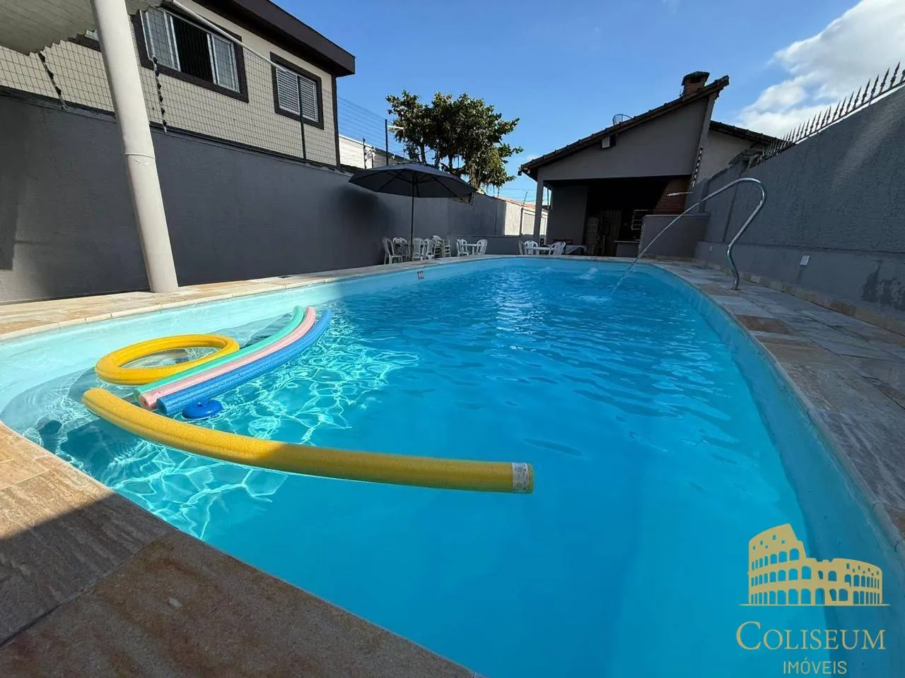 Foto do imóvel Casa com 2 dormitórios à venda, 84 m² por R$ 735.000,00 - Vilamar - Praia Grande/SP