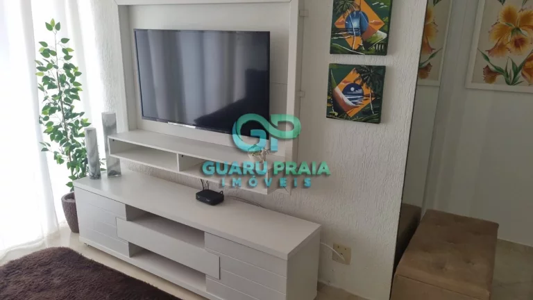Imagem 1 dormitórios, sala para 2 ambientes com sacada, cozinha com armários planejados, banheiro social e área de serviço