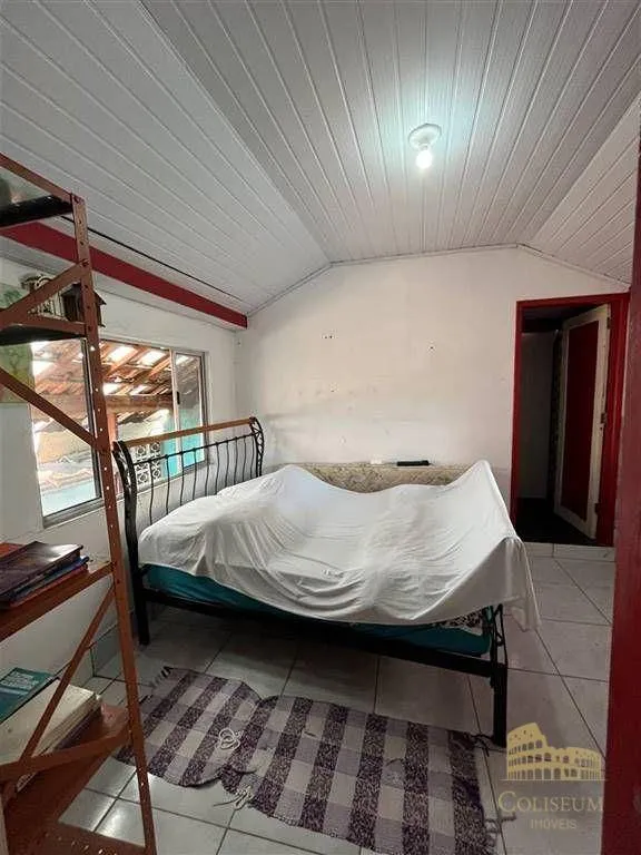 Imagem Casa com 3 dormitórios à venda, 95 m² por R$ 549.000,00 - Boqueirão - Praia Grande/SP