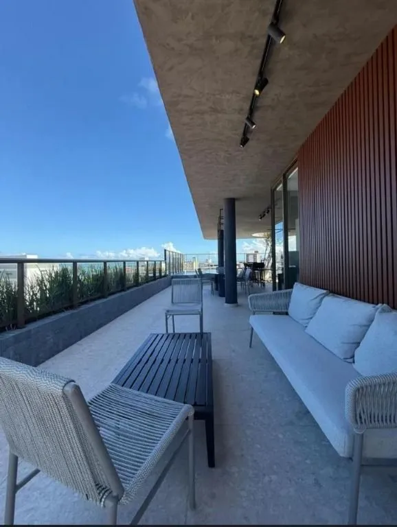 Imagem Flat novo em Camboinha, a 1 rua do mar, com rooftop e alto potencial para Airbnb. Ideal para investir ou morar.