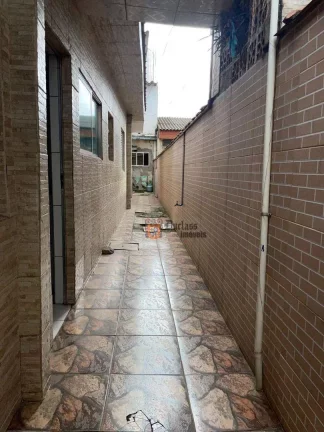 Imagem Casa com 2 dormitórios à venda por R$ 400.000 - Catiapoã - São Vicente/SP