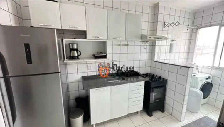 Imagem Apartamento com 2 dormitórios à venda, 55 m² por R$ 299.900,00 - Mirim - Praia Grande/SP