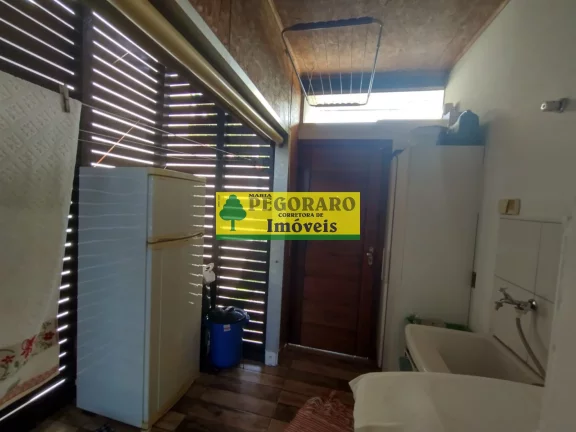 Imagem Casa à venda em Caraguatatuba-SP: 3 quartos, suíte, sala com vista para o mar e deck com hidro!