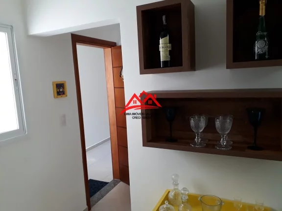 Imagem Apartamento à venda Itaguá, Ubatuba, com varanda gourmet, 3 suítes, lavabo, 2 vagas, piscina, sauna, academia