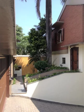 Imagem Sobrado com 383 metros quadrados de área útil, com 3 dormitórios sendo 3 suítes, 1 suíte com cl...