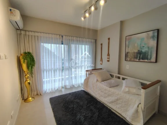 Imagem Apartamento atualizado e reformado com vista para o mar e lazer, 3 quartos com suíte e 2 vagas na Pitangueiras, Guarujá-SP - 165m² de área.