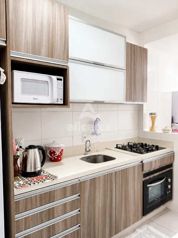 Imagem Apartamento com 2 dormitórios, suíte e churrasqueira na sacada em Areias - São José/SC
