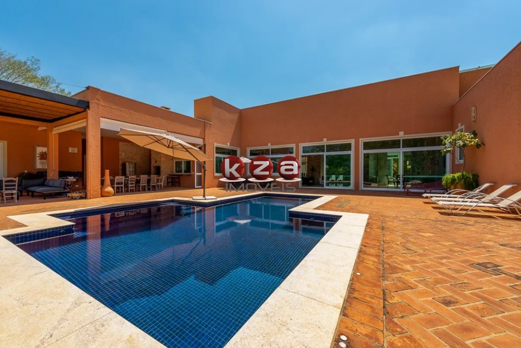 Imagem Luxuosa mansão de alto padrão a venda no Condomínio Terras de São José em Itu- SP, com 5 suítes, amplo gourmet com piscina e 1.500m² de área.