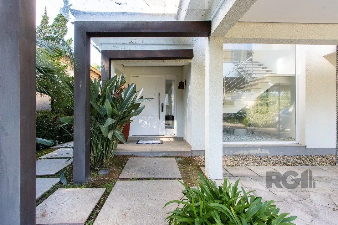 Imagem Casa no Condomínio Las Rocas, vista para o Guaíba, com 5 suítes