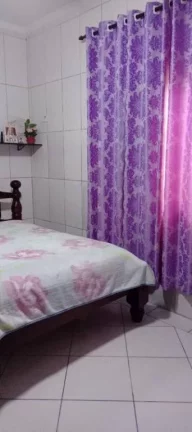 Imagem Casa com 2 dormitórios à venda por R$ 650.000 - Ocian - Praia Grande/SP