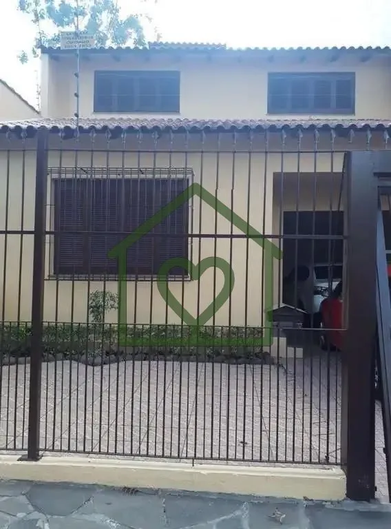Imagem Ótimo casa/sobrado no bairro Auxiliadora, com 3 dormitórios, 3 vagas de garagem e anexo nos fundos...