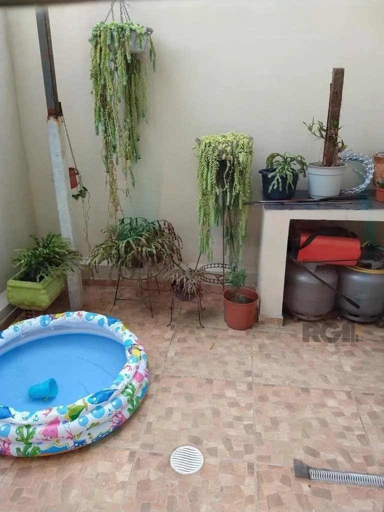 Imagem Casa 3 quartos, 4 vagas, salão de festa, sacada 198m² bairro Rubem Berta, Poa/RS