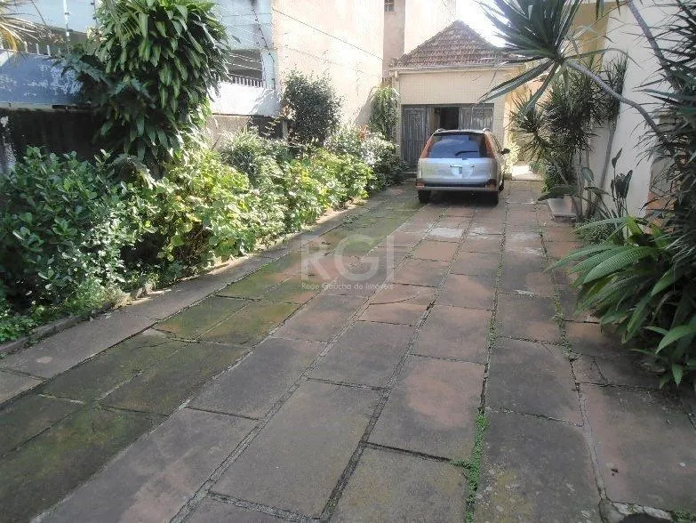 Imagem Casa para Venda - 159m², 3 dormitórios, 3 vagas - Menino Deus