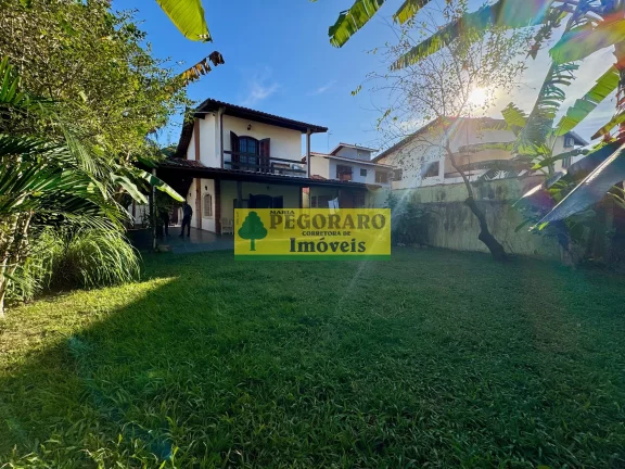 Imagem Casa à venda em Caraguatatuba Martim de Sá 3 quartos, 3 suítes, 1 sala, 3 banheiros, 10 vagas de garagem. 166m² de área.