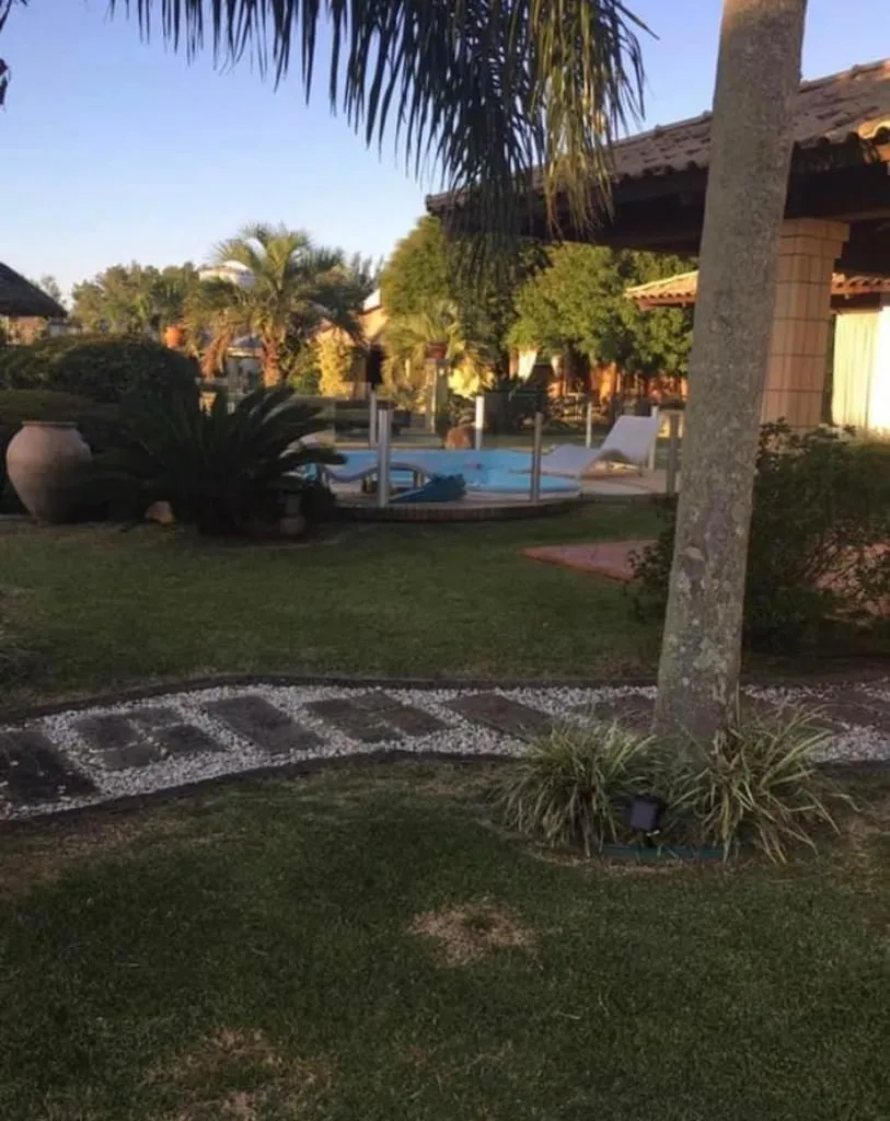 Imagem Casa na praia de Atlântida de 4 dormitórios