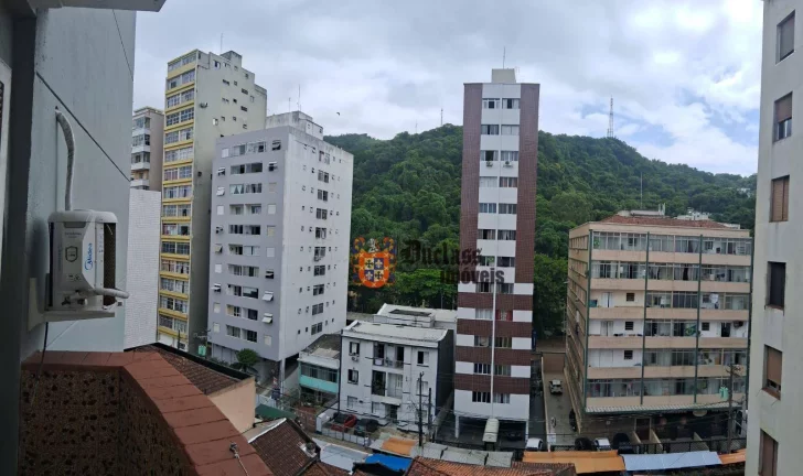Imagem Apartamento com 3 dormitórios à venda, 102 m² por R$ 300.000 - Itararé - São Vicente/SP