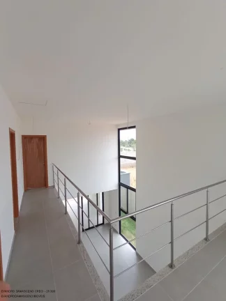 Imagem Luxuosa casa em condomínio à venda em Lauro de Freitas-BA, no bairro Buraquinho, com 4 quartos, 4 suítes, 2 salas, 1 banheiro, 2 vagas de garagem e 350m² de área.