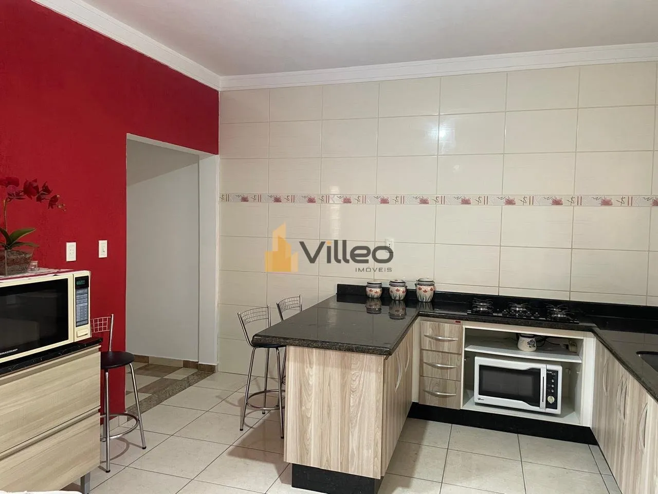 Imagem Descubra uma rara oportunidade de viver com elegância e praticidade em um sobrado moderno e bem dis...
