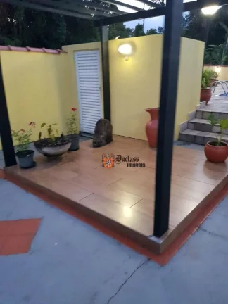 Imagem Casa com 3 dormitórios à venda, 258 m² por R$ 1.699.000,00 - Morada da Praia - Bertioga/SP
