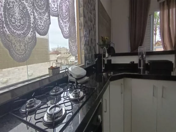 Imagem Casa com 2 dormitórios à venda, 63 m² por R$ 410.000,00 - Mirim - Praia Grande/SP