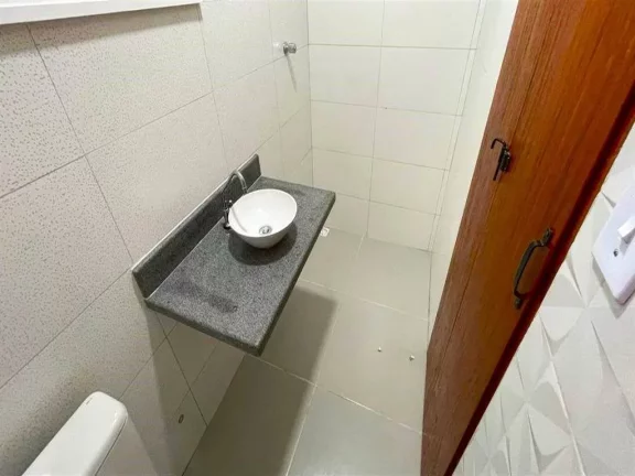 Imagem Casa com 2 dormitórios à venda, 130 m² por R$ 400.000 - Caiçara - Praia Grande/SP