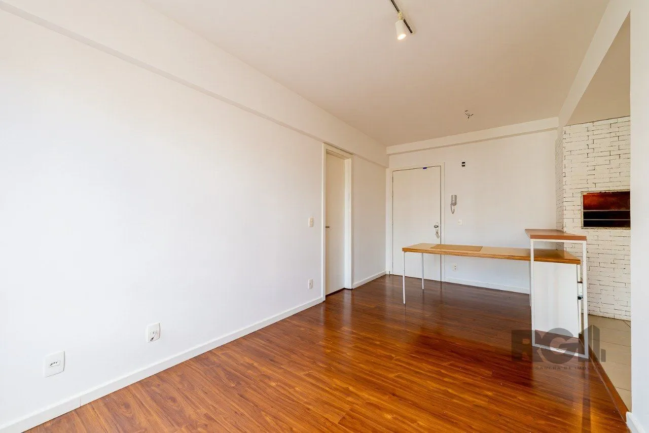 Imagem Apartamento de um quarto, suíte e uma vaga de garagem no bairro Santa Cecilia em Porto Alegre.