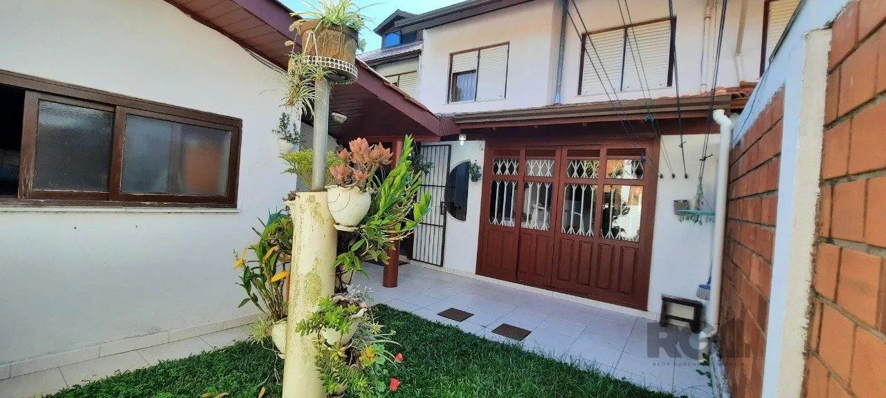 Imagem Casa Condominio para Venda - 129.58m², 3 dormitórios, sendo 1 suites, 3 vagas - Cavalhada