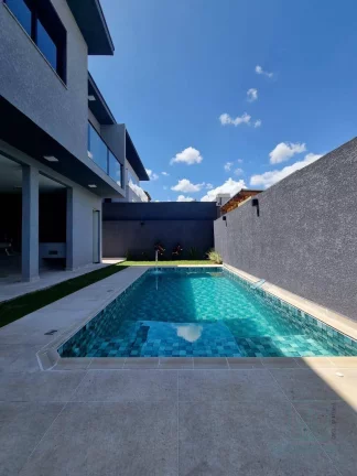 Imagem Casa 3 suítes e 4 vagas garagem, piscina , Condomínio Terras de Atibaia 1