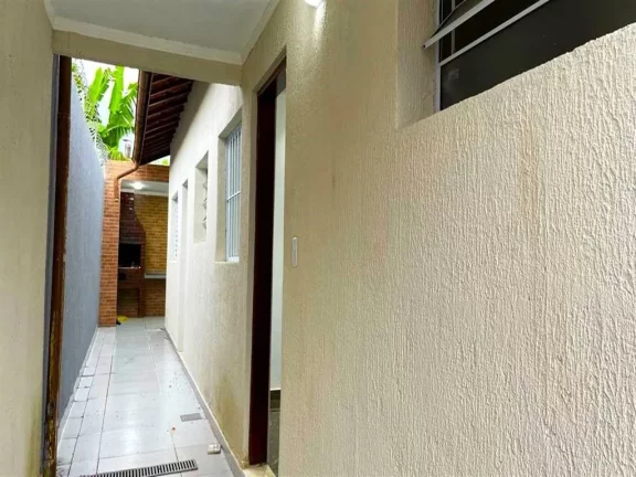 Imagem Casa com 2 dormitórios à venda, 130 m² por R$ 400.000 - Caiçara - Praia Grande/SP