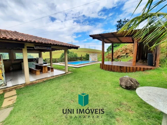Imagem Chácara com 2 casas mais casa de caseiro, área de lazer, 10.000M² a venda na zona rural de Guarapari.