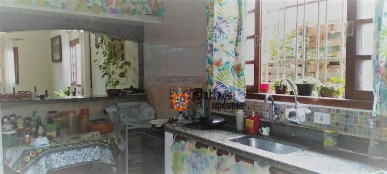 Imagem Casa com 3 dormitórios à venda, 135 m² por R$ 600.000 - Maracanã - Praia Grande/SP