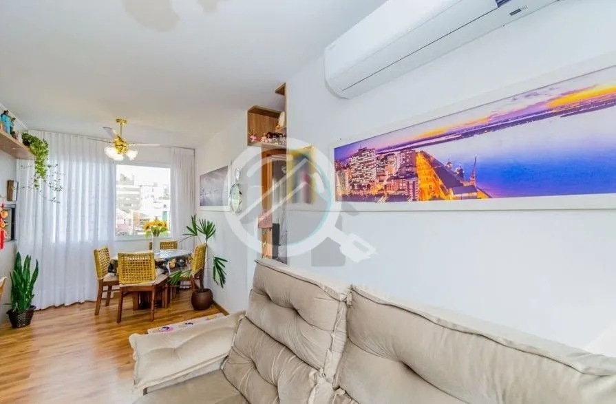 Imagem Apartamento com 57m², dois dormitórios sendo uma suíte, living, cozinha tipo americana, área de ...