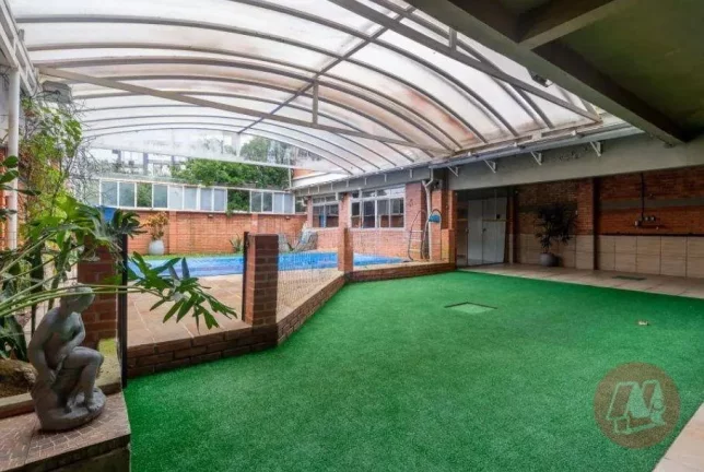 Imagem Casa com 3 dormitórios, 299 m² - venda por R$ 2.385.000,00 ou aluguel por R$ 23.499,00/mês - Boa Vista - Porto Alegre/RS