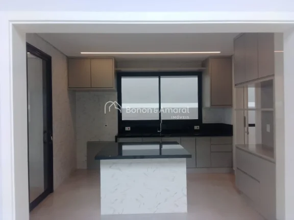Imagem Esta espetacular casa oferece 263 m² de área construída e um amplo terreno de 353,80 m², proporc...