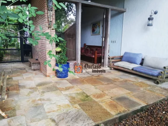 Imagem Casa com 4 dormitórios à venda, 160 m² por R$ 1.000.000 - Balneário Praia do Pernambuco - Guarujá/SP