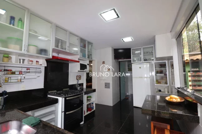 Imagem Casa à venda em Mário Campos Condomínio Serra dos Bandeirantes