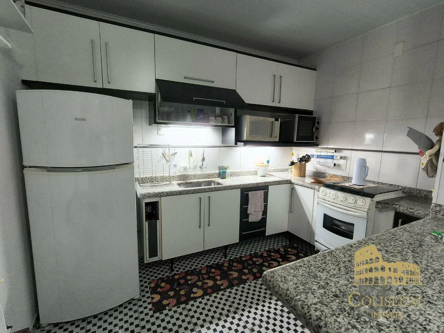 Imagem Casa com 2 dormitórios à venda, 130 m² por R$ 550.000,00 - Vila Guilhermina - Praia Grande/SP
