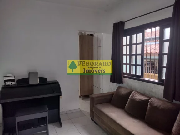 Imagem Casa à venda em Caraguatatuba-SP, bairro Rio do Ouro: 2 quartos, 2 salas, 2 banheiros, 2 vagas de garagem, 127m² - com piscina e churrasqueira!