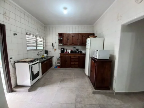 Imagem Sobrado com 3 dormitórios à venda, 148 m² por R$ 900.000,00 - Canto do Forte - Praia Grande/SP