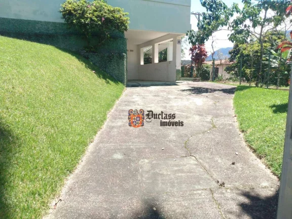 Imagem Casa com 2 dormitórios à venda, 113 m² por R$ 650.000 - Massaguaçu - Caraguatatuba/SP