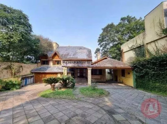 Imagem Casa com 3 dormitórios para alugar, 500 m² por R$ 19.884,00/mês - Pedra Redonda - Porto Alegre/RS