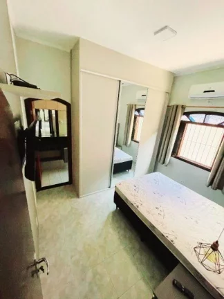 Imagem Casa com 2 dormitórios à venda, 56 m² por R$ 410.000 - Vila Caiçara - Praia Grande/SP