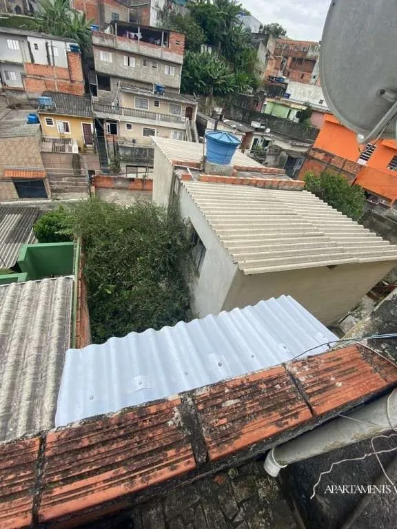 Imagem Terreno com 3 Casas com 3 vagas de carro e moto.
