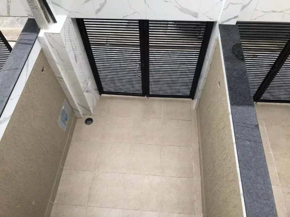 Imagem Sobrado com 2 dormitórios à venda, 60 m² por R$ 390.000,00 - Caiçara - Praia Grande/SP